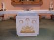 Engraving on the Altar depicts the breaking of bread with deciples following meeting on the road to Emmaus.