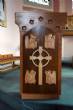 Lectern. Depicting symbols of the four Gospel authors.